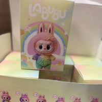 Labubu toy with packaging featuring a colorful design