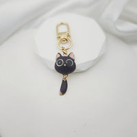 Big Eye Cat Hanging Tail Keychain