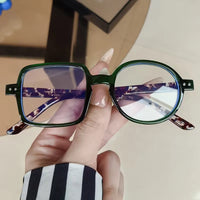 Retro Asymmetric Statement Glasses