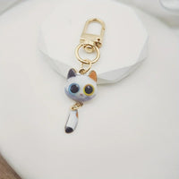 Big Eye Cat Hanging Tail Keychain