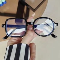 Retro Asymmetric Statement Glasses