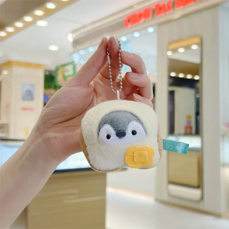 Globetrotter Penguin Plush Keychain