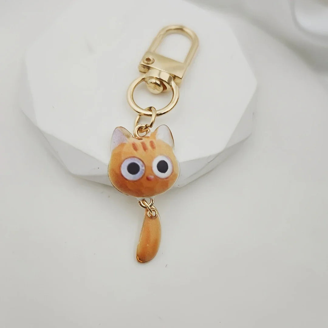 Big Eye Cat Hanging Tail Keychain