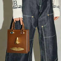 Surrealist Visage Premium Abstract Handbag