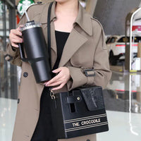 The Crocodile Tumbler Sling Bag