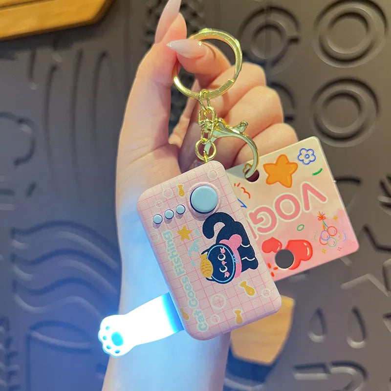 Fishing Cat Pop-up Paw LED Keychain