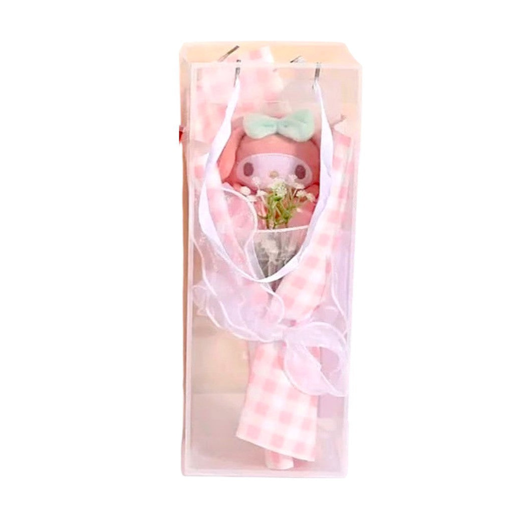 Plush toy in a clear gift bag with a pink checkered pattern on a white background
