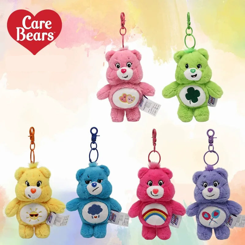 Set of colorful Care Bear keychains on a soft, multicolored background with Care Bears logo.