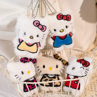 Set of Hello Kitty-themed keychains in a basket with a blurred background