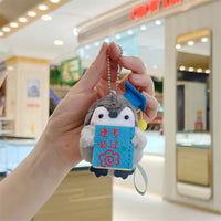 Globetrotter Penguin Plush Keychain