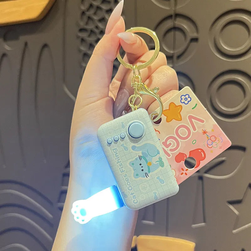 Fishing Cat Pop-up Paw LED Keychain