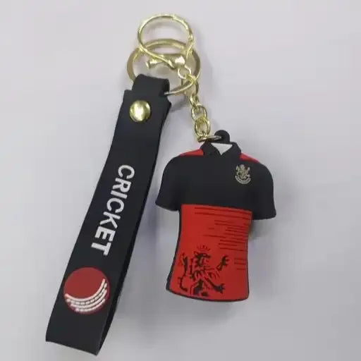 Keychain with cricket-themed design on a gray background