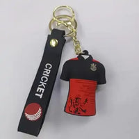 Keychain with cricket-themed design on a gray background
