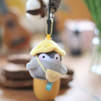 Globetrotter Penguin Plush Keychain