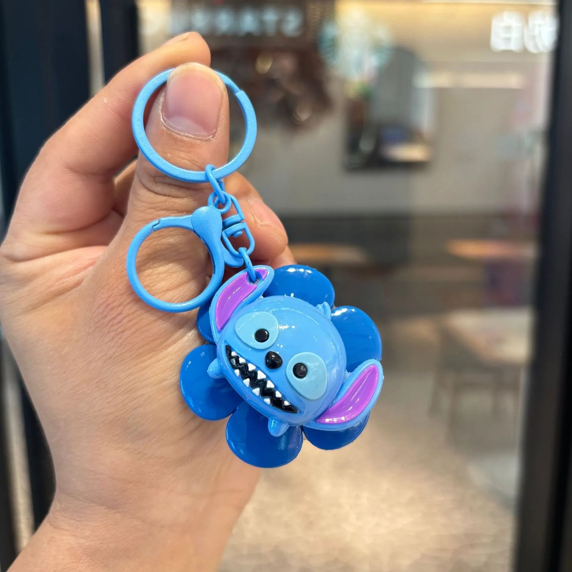 DZNY Rotating Flora Buddies Keychain