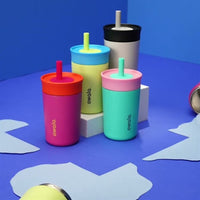 Colorful owala kids tumblers on a blue background