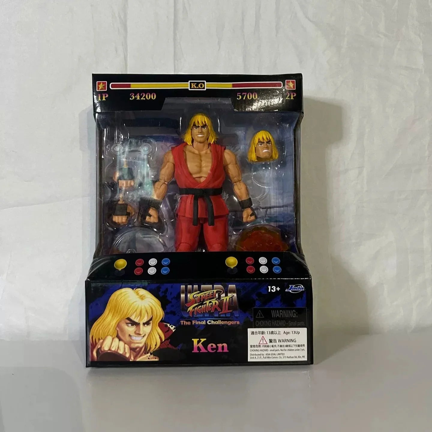 Action figure packaging with character illustration on a white background