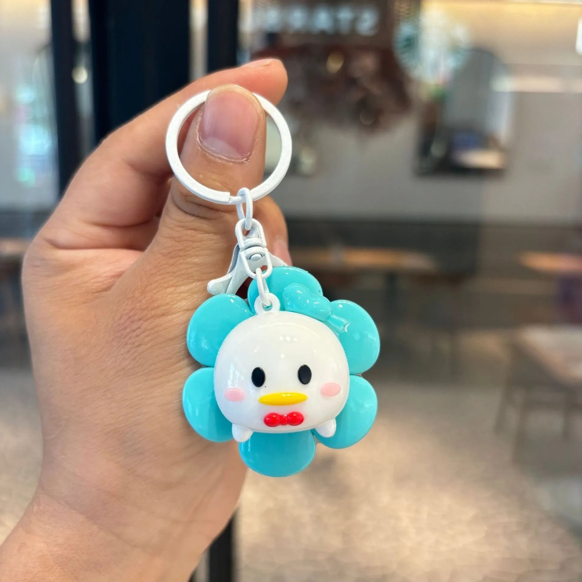 DZNY Rotating Flora Buddies Keychain