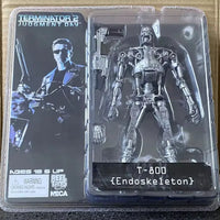 Action figure of T-800 Endoskeleton from Terminator 2 in packaging with Terminator 2 poster.