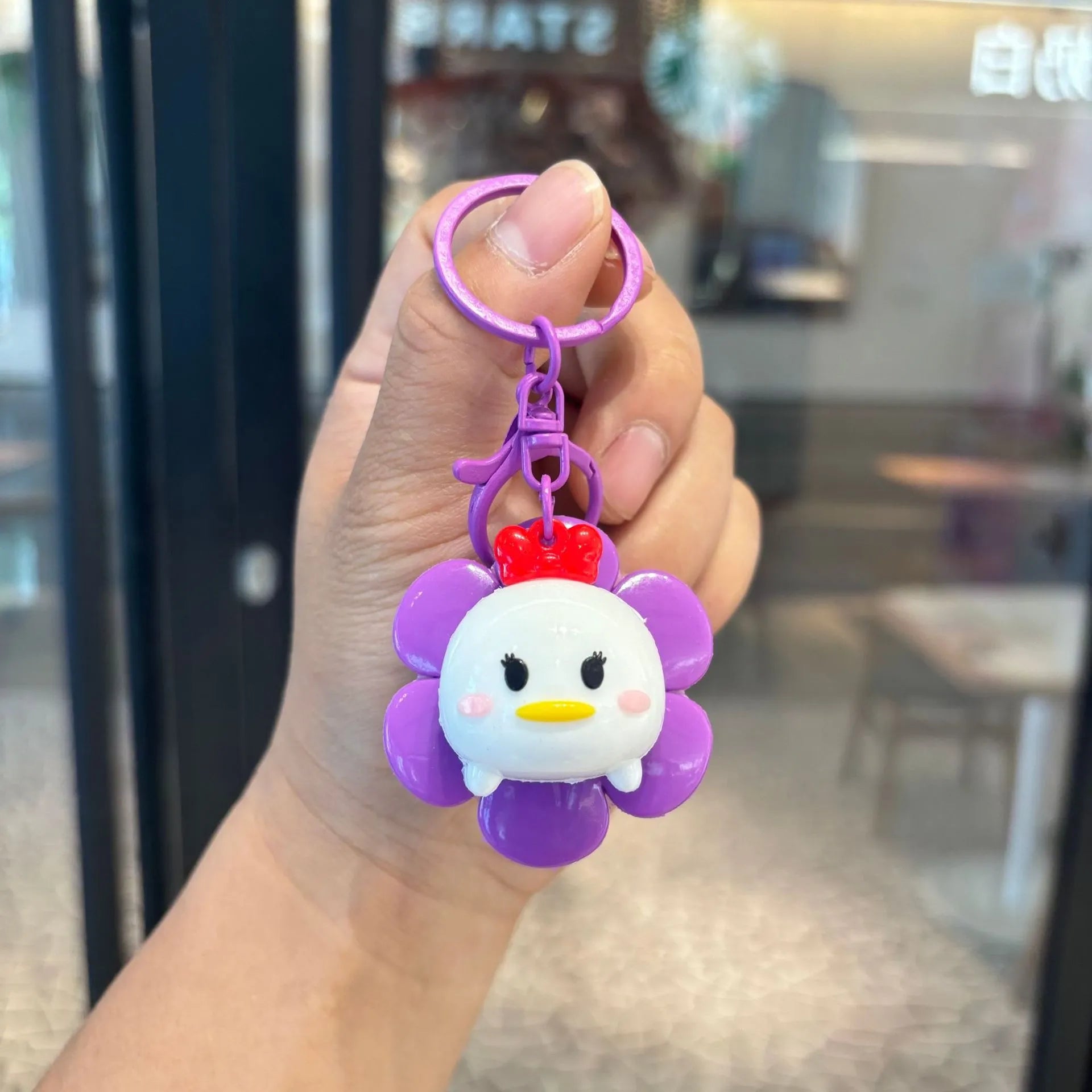 DZNY Rotating Flora Buddies Keychain