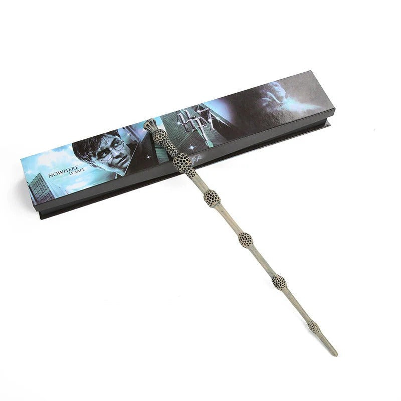 Fantasy wand with decorative elements on a white background