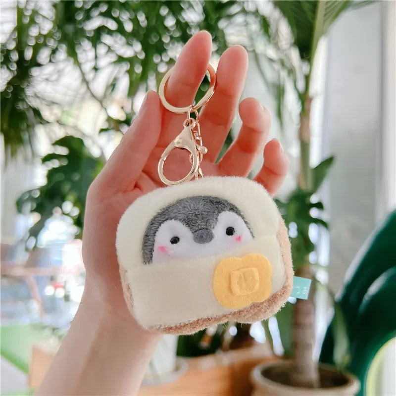 Globetrotter Penguin Plush Keychain