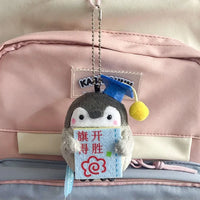 Globetrotter Penguin Plush Keychain