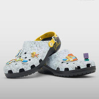 Children's clogs with cartoon characters on a gray background