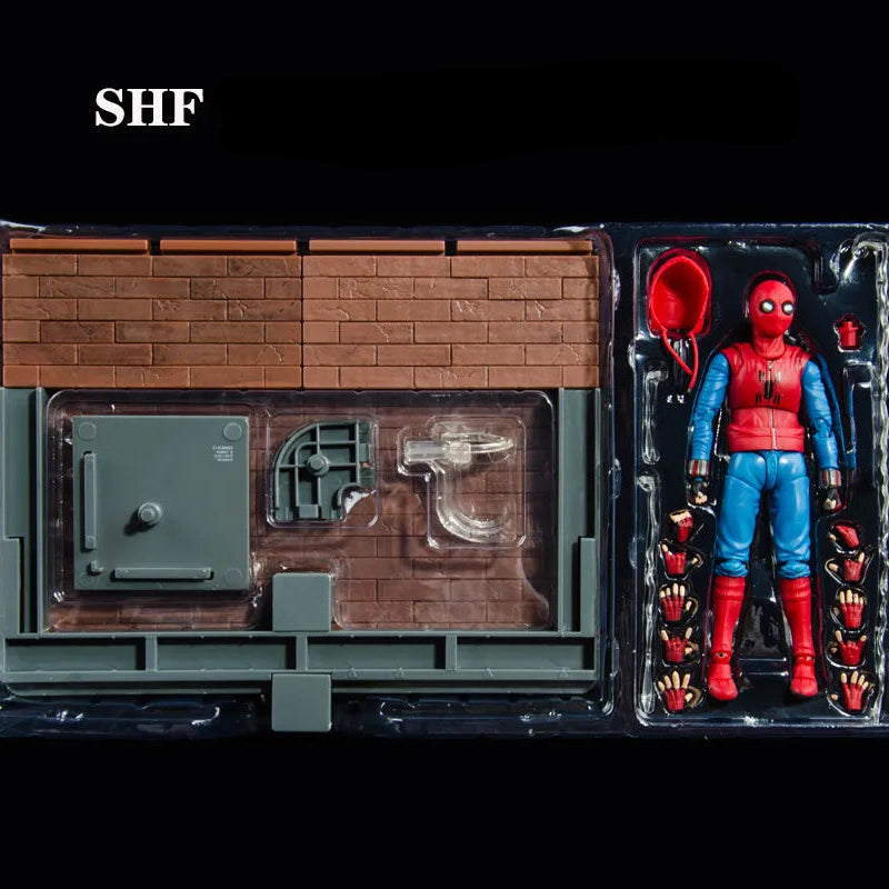 Spider-Man action figure in packaging with a miniature house model