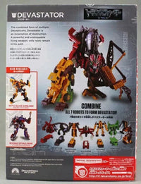 Boxed set of Transformers Devastator toy with multiple smaller figures on a gray background