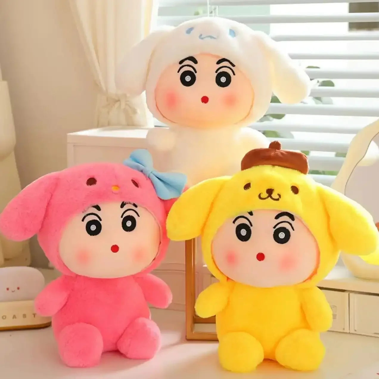 Three shinchan plush toys in animal costumes on a light background