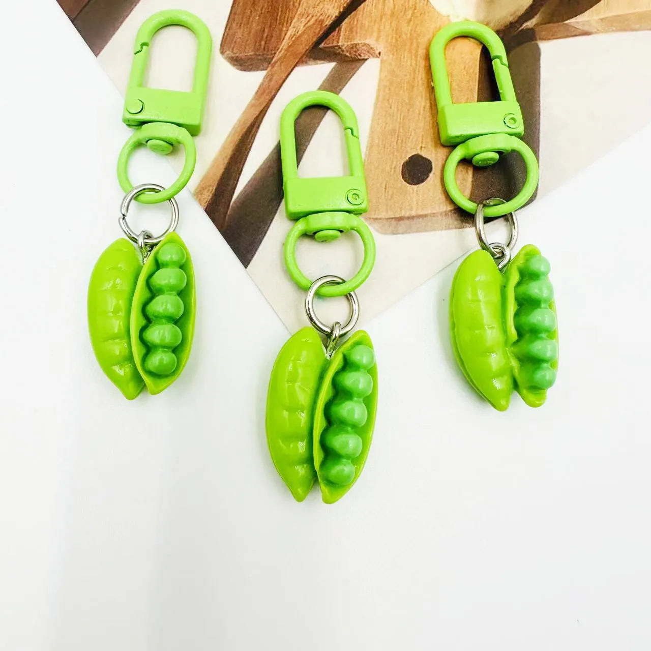 Creative Pea Pod Simulation Keychain