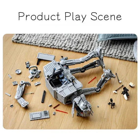 Star Wars AT-AT model kit on a wooden surface with building pieces, and completed model on a table.