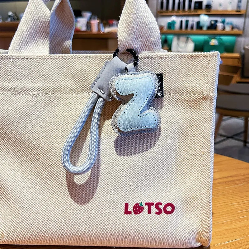 Signature Style Leather Letter Keychain