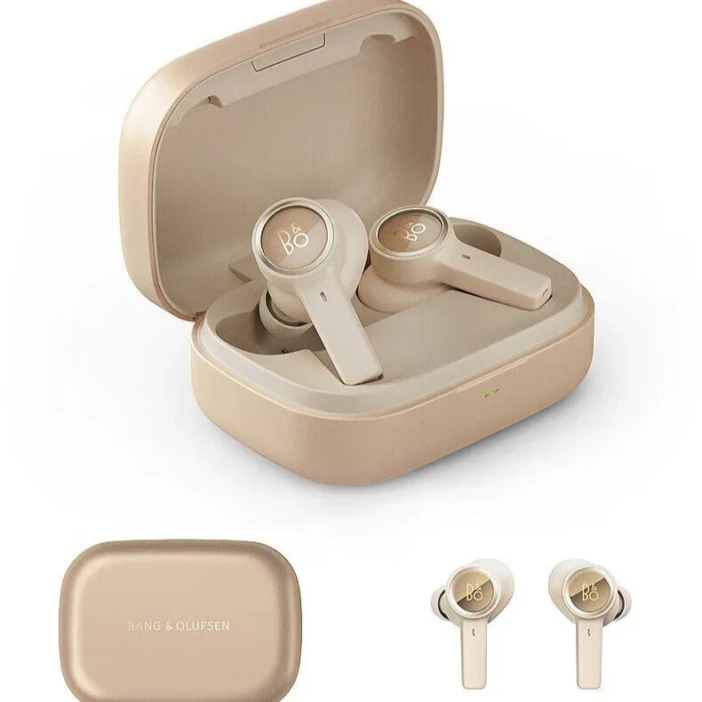Beige wireless earbuds with charging case on a white background, featuring B&O logo.