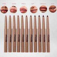 Set of lip pencils with 'rhode' branding and sample lip swatches above them.