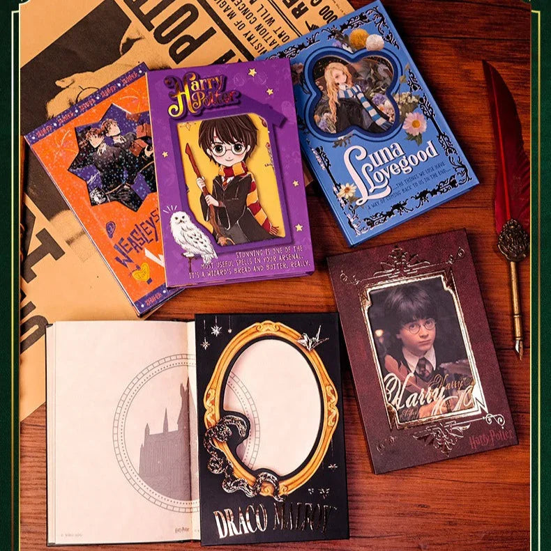 Collection of 'Harry Potter' themed stationery items on a wooden surface.