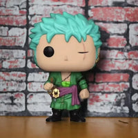 Funko Pop! vinyl figure with teal hair against a brick wall background