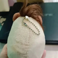 سلسلة مفاتيح من القطيفة على شكل كابي مشطوف 