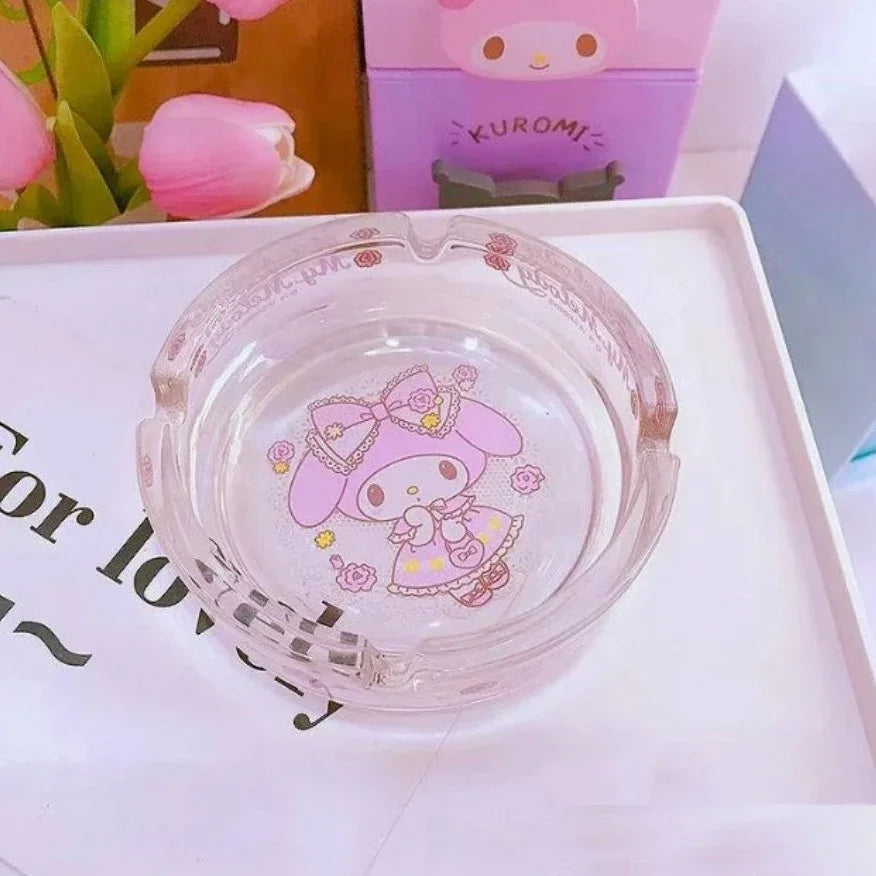 Clear plastic case with cartoon character design on a white surface with tulips in the background.